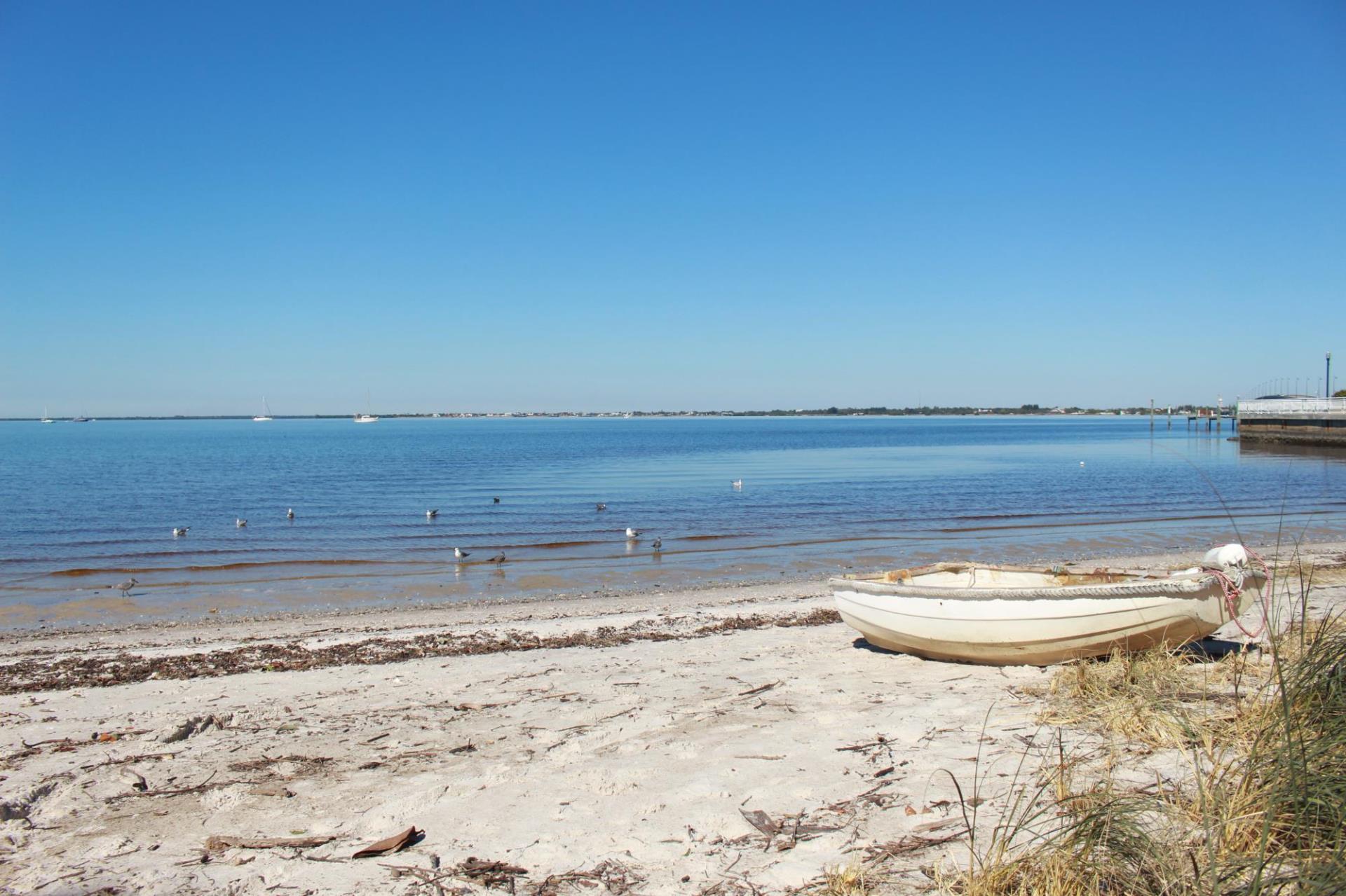 gilchrist beach with boat on the side 