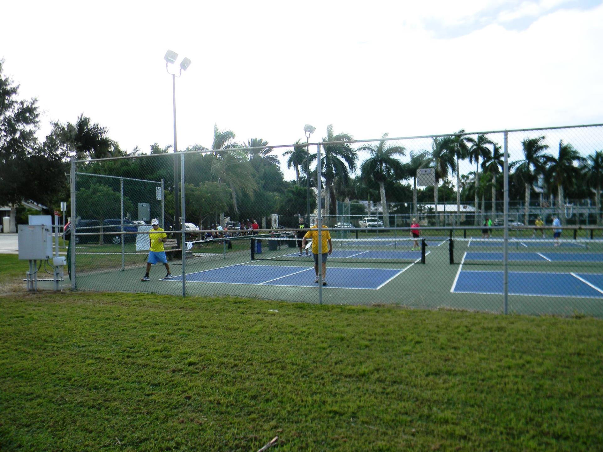 people playing pickleball in pickleball courts in gilchrest park