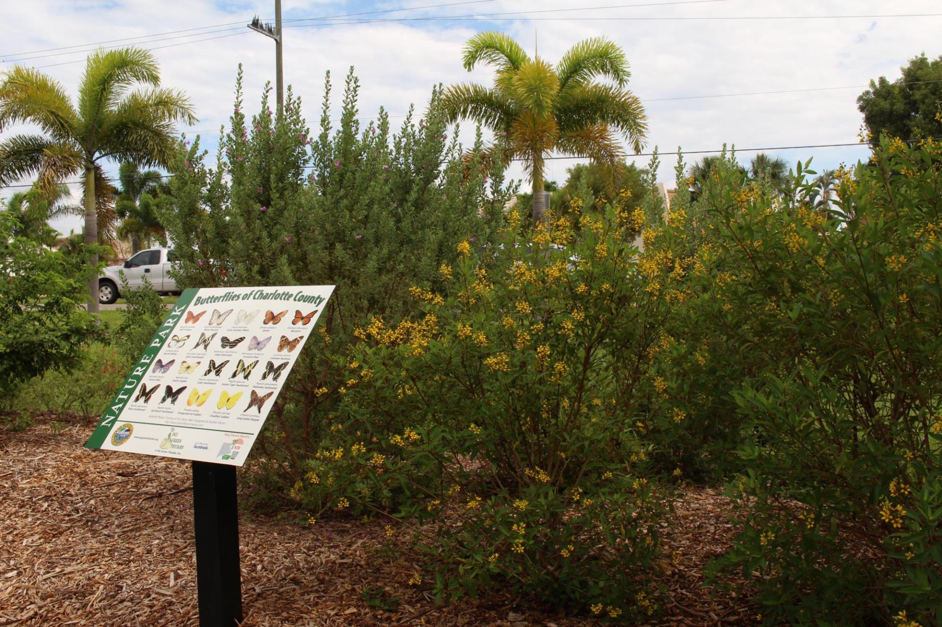 nature park with sign of butterflies of charlotte county